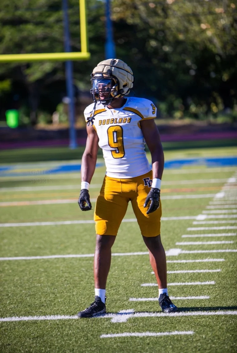 Travis Isaacs, No. 9, ready in his stance